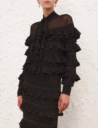 Top Rebellion s volánky a vázáním u krku v metalické černé barvě online Top Rebellion s volánky a vázáním u krku v metalické černé barvě online